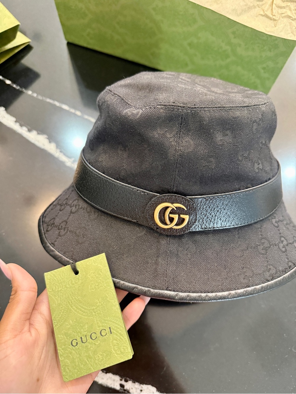Brand new Gucci Black GG Monogram Bucket Hat with Leather Band and Gold GG